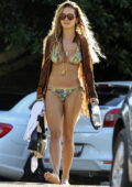 Rita Ora shows off her incredible bikini body during a beach day with  friends in Sydney