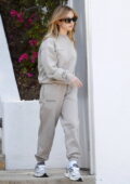 Sydney Sweeney looks casual yet trendy in a grey sweatsuit and Miu Miu sunglasses while stepping out in Los Angeles