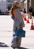 Heidi Klum puts on a stylish display in a backless outfit as she arrives at AGT Studios in Pasadena, California
