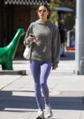 Alessandra Ambrosio looks radiant in an oversized white hoodie and baby blue  leggings while grabbing a smoothie in Malibu, California-060923_21