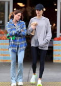 Alessandra Ambrosio sports a grey hoodie and black leggings as she goes grocery shopping in West Hollywood, California