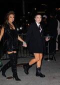 Florence Pugh and Ashley Park hold hands while arriving for the Boom Met Gala afterparty at the Standard Hotel in New York City