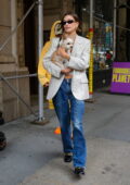 Hailey and Justin Bieber step out with their adorable pups as they visit a friend in New York City