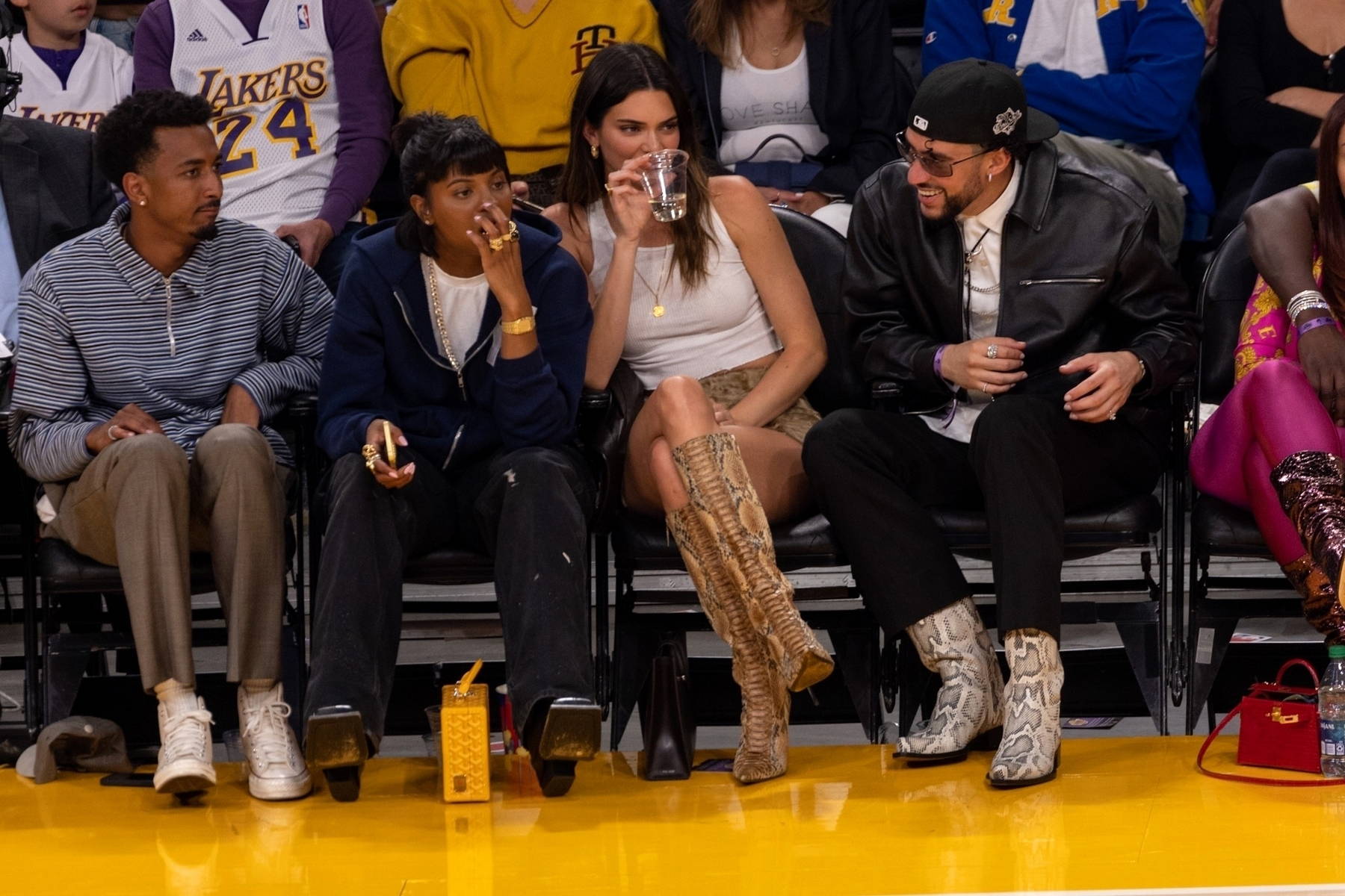 Kendall Jenner is all smiles while seen courtside with new