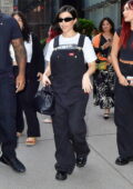 Kourtney Kardashian dons black overalls while heading out to Blink 182's concert in New York City