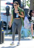 Lucy Hale dons a tank top and heather grey leggings as she leaves a gym in Los Angeles