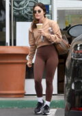 Lucy Hale shows off her curves in brown leggings while stopping for coffee in Studio City, California