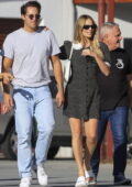 Margot Robbie looks radiant in a monochrome mini dress while out for lunch with husband Tom Ackerley in Byron Bay, Australia