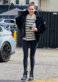 Nina Dobrev dons a striped sweater and leggings while out for an alfresco lunch with friends in Los Feliz, California