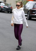 Olivia Wilde shows off her rock-hard abs in purple sports bra and leggings  while leaving