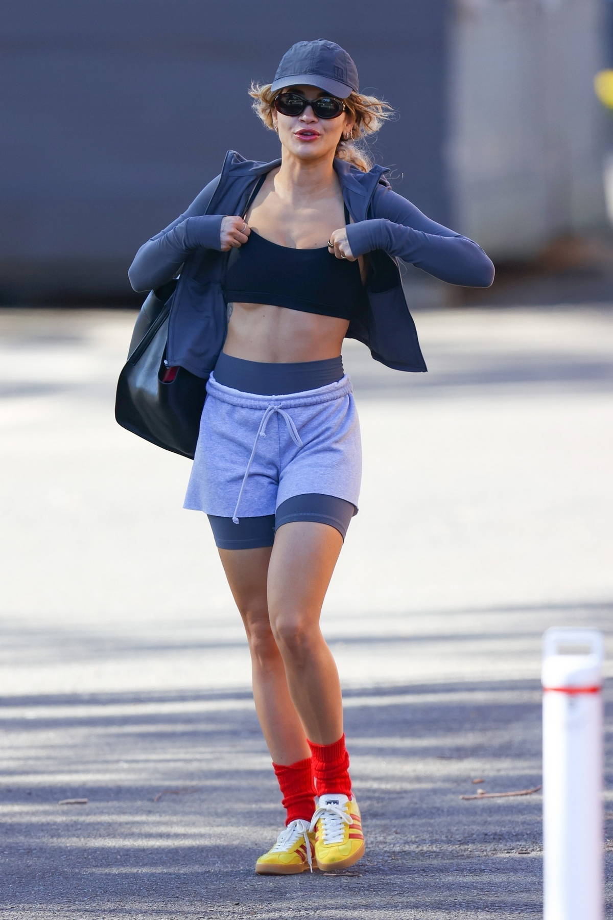 Camila Cabello sports a set of beige sport bra and leggings while out on a  hike