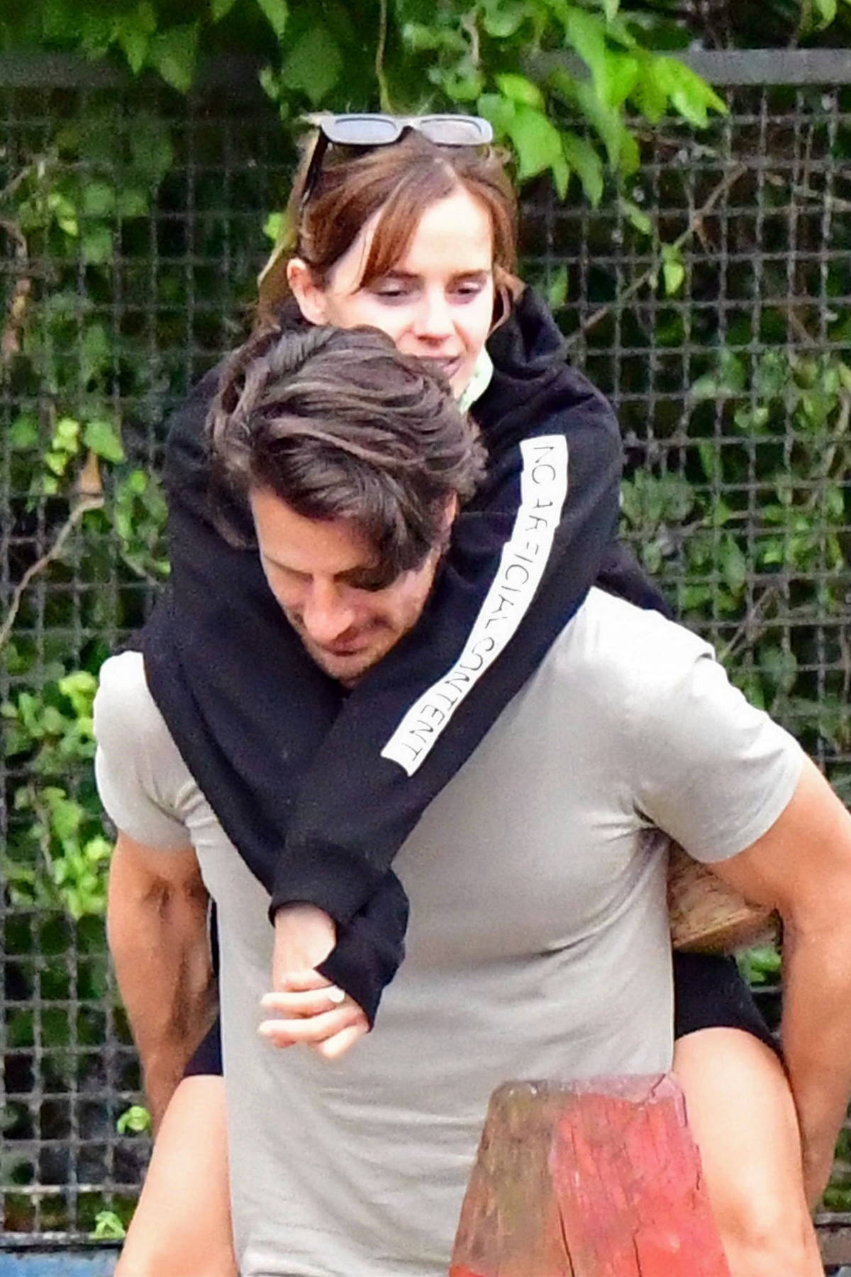 Emma Watson enjoys piggyback ride on Ryan Kohn while out in Venice Lido,  Italy