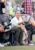 Hilary Duff is all smiles while attending her son's soccer game with husband Matthew Koma and ex-husband Mike Comrie in Los Angeles