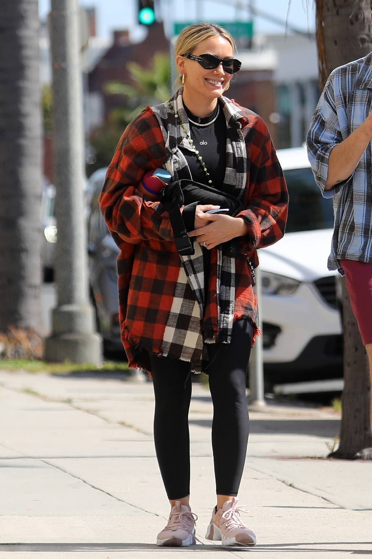 Hilary Duff wears a flannel shirt and leggings while stepping out for lunch  with husband Matthew