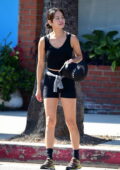 Jamie Chung looks fit in a black tank top and lycra shorts as she heads to her morning workout in Los Angeles