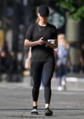Jennifer Lawrence wears a black t-shirt with matching leggings