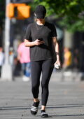 Jennifer Lawrence wears a black t-shirt with matching leggings while  heading to the Gym in