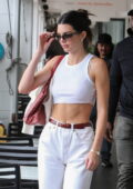 Kendall Jenner flashes her taut tummy in a white crop top as she steps out  for lunch in New York City