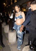 Rihanna bares her baby bump in a tiny bra top with matching pants while  heading out