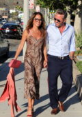 Brooke Burke wears an animal print dress as steps out for a dinner date with her fiancé Scott Rigsby at Nobu in Malibu, California