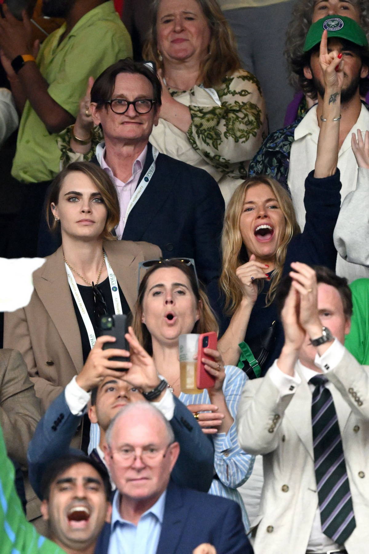 Cara Delevingne and Sienna Miller attend Day 8 of the Wimbledon Tennis Championships in London, UK