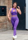 Danielle Lloyd flaunts her curves in a set of purple crop top and