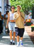 Hailey Bieber flashes her midriff while stepping out for lunch with hubby Justin Bieber in Southampton Village, New York