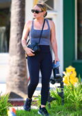 Hilary Duff looks fit in a white tank top and dark brown leggings while out  heading for her workout in Los Angeles-170623_5