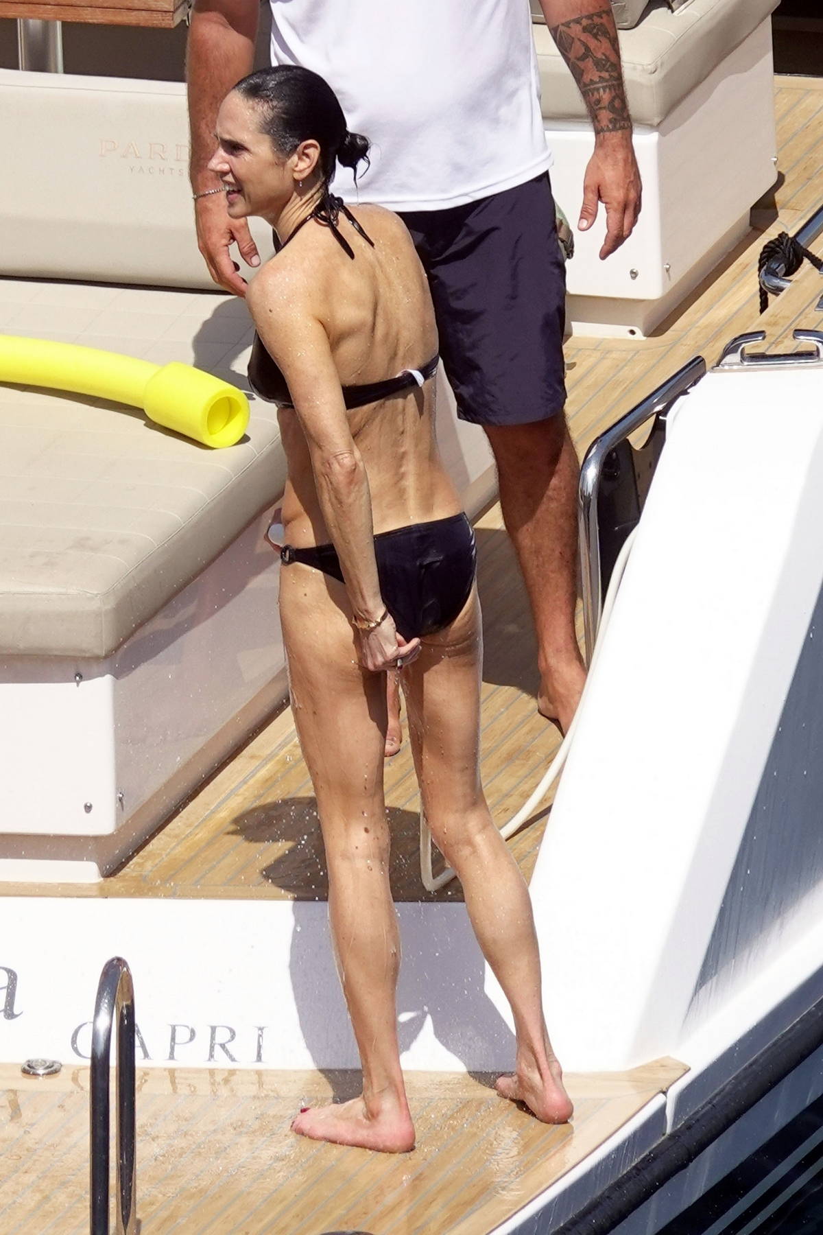 Jennifer Connelly dons tiny black bikini for yacht trip with husband Paul  Bettany, Celebrity News, Showbiz & TV