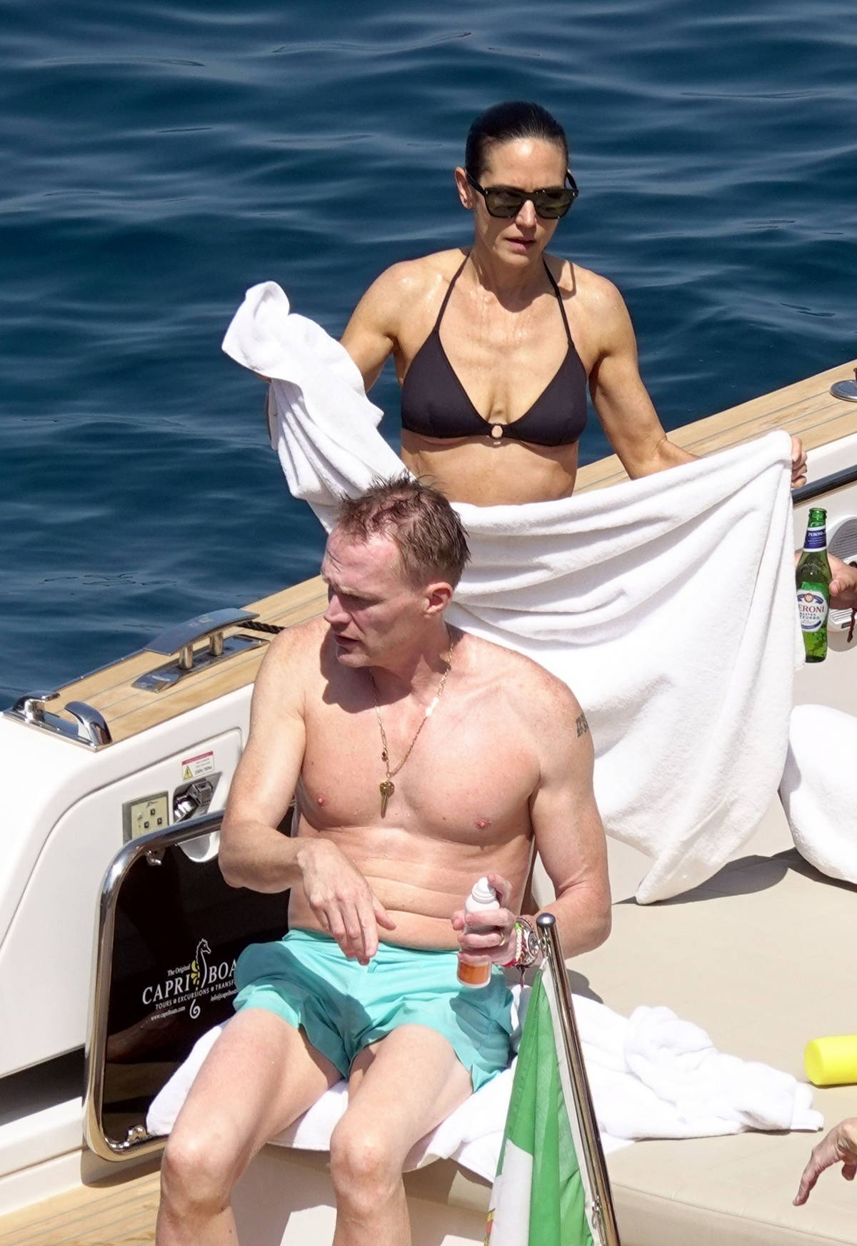 Jennifer Connelly stuns in a black bikini while relaxing on a yacht with  husband Paul Bettany during their vacation in Capri, Italy-120723_3