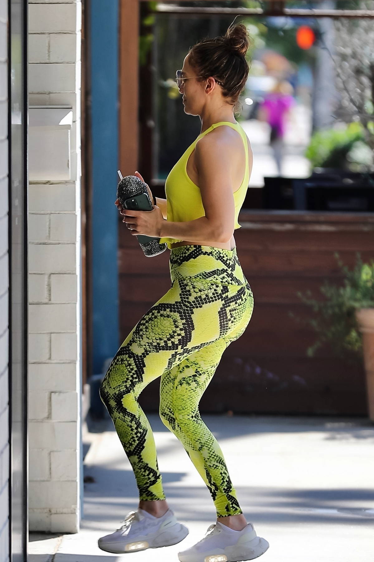 Jennifer Lopez goes makeup free as she hits the gym sporting snakeskin print leggings and yellow tank top in Studio City California 190723 6