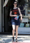 Krysten Ritter picks up a kids book while out running a few errands ahead of the weekend in Los Angeles