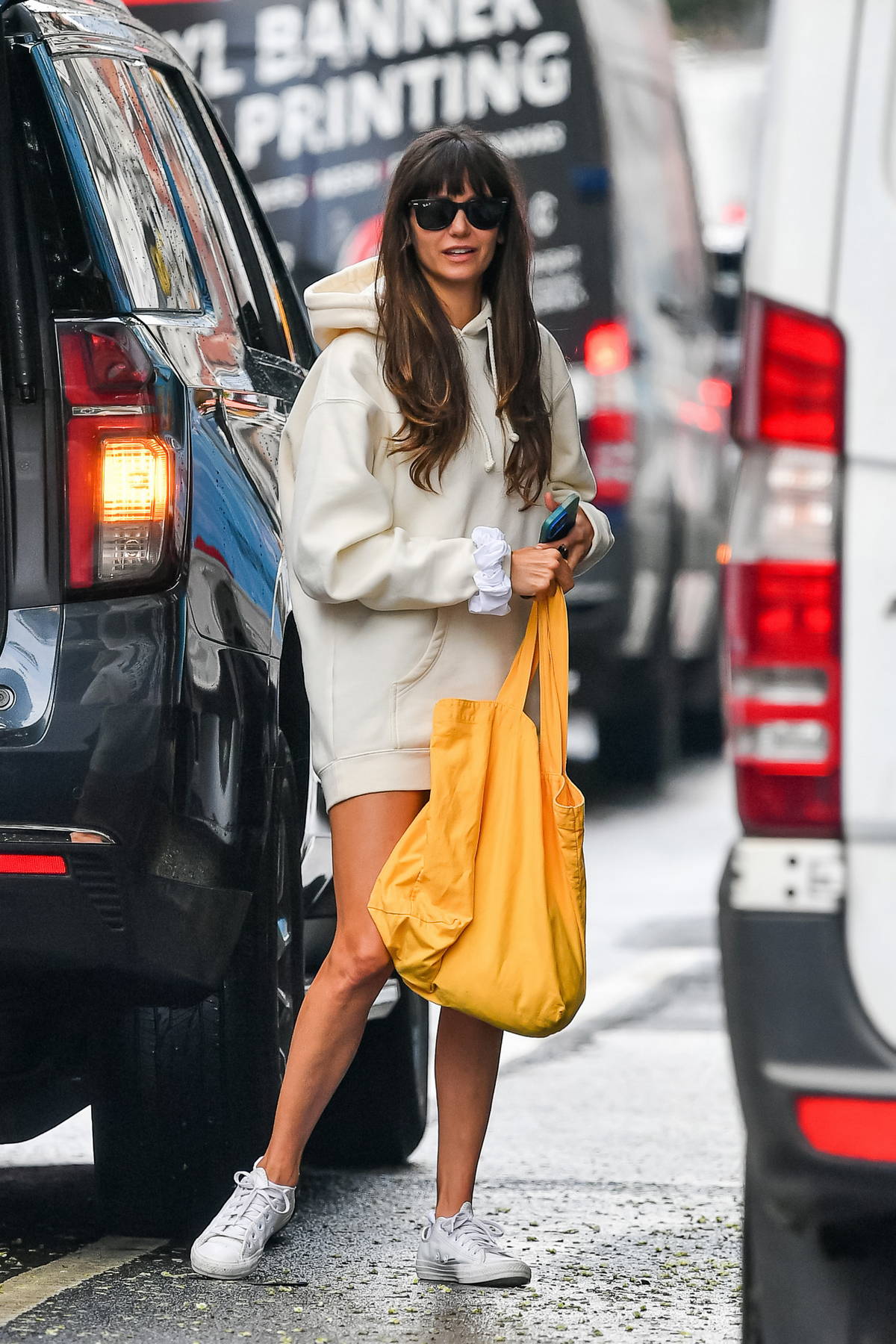 Nina Dobrev puts on a leggy display on a grocery store run as her