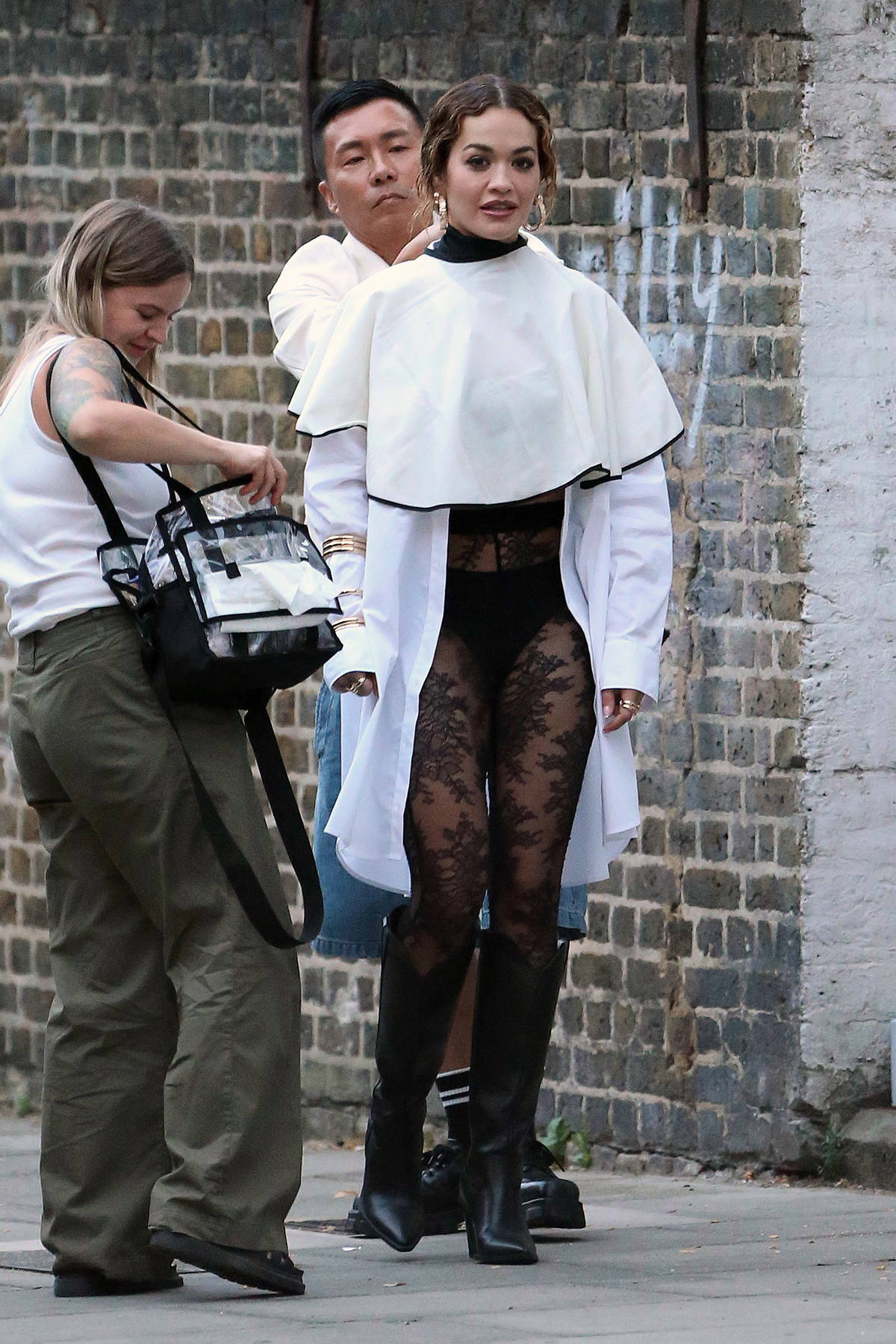 https://www.celebsfirst.com/wp-content/uploads/2023/07/Rita-Ora-spotted-in-see-through-lacy-leggings-while-filming-a-new-project-in-Notting-Hill-London-UK-290723_2.jpg