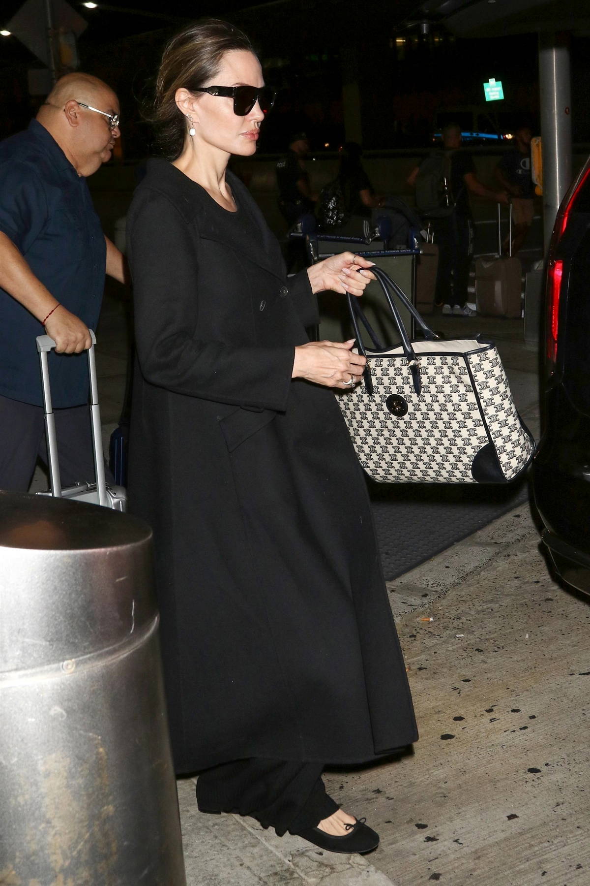 Angelina Jolie is chic in all-black as she touches down at JFK