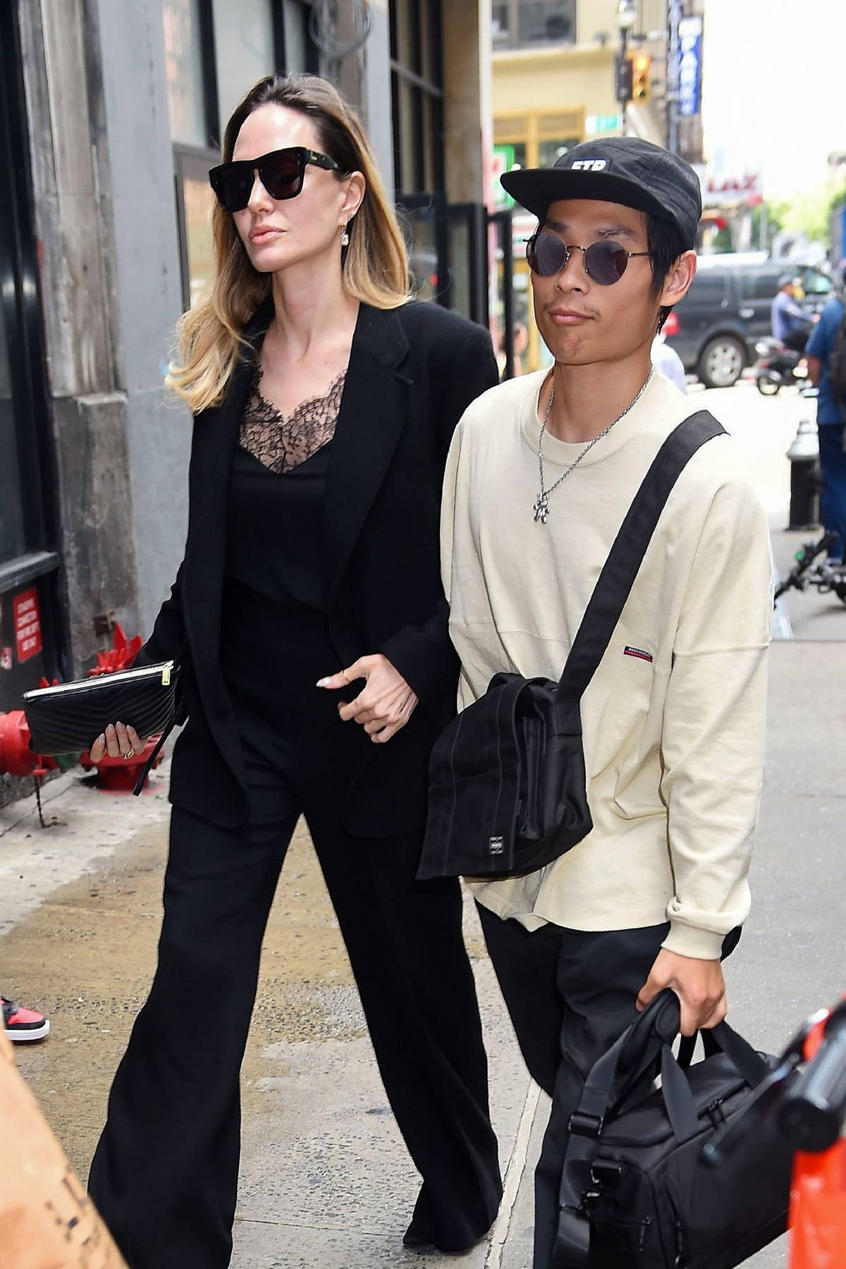 Angelina Jolie looks classy as ever in black pantsuit while