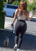 Francia Raisa shows off her curvy figure in a crop top and leggings while  walking her dog in Los Angeles-040823_11