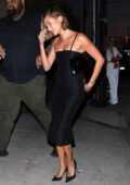 Hailey Bieber looks gorgeous in a black bodycon dress while stepping out for dinner at Giorgio Baldi in Santa Monica, California