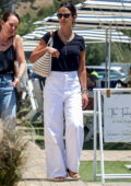 Jordana Brewster wears a black top and white jeans while shopping at Fred Segal with a friend in Malibu, California