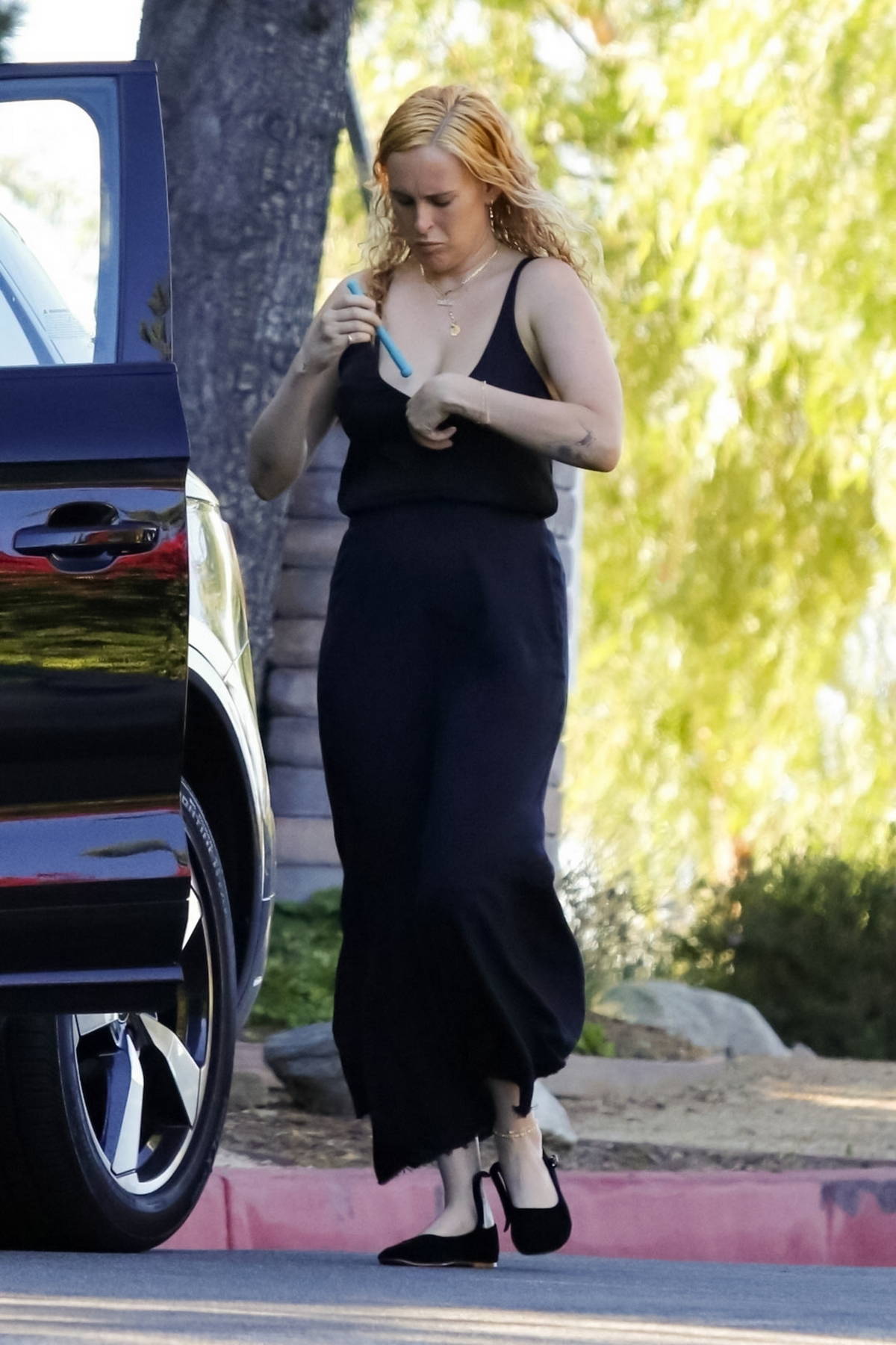 Rumer Willis dons a black dress as she goes shopping with her newborn baby  at Clare V in West Hollywood, California-150823_5