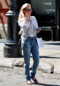 Emma Roberts looks casual yet stylish in a striped shirt and jeans while out for some shopping in New York City