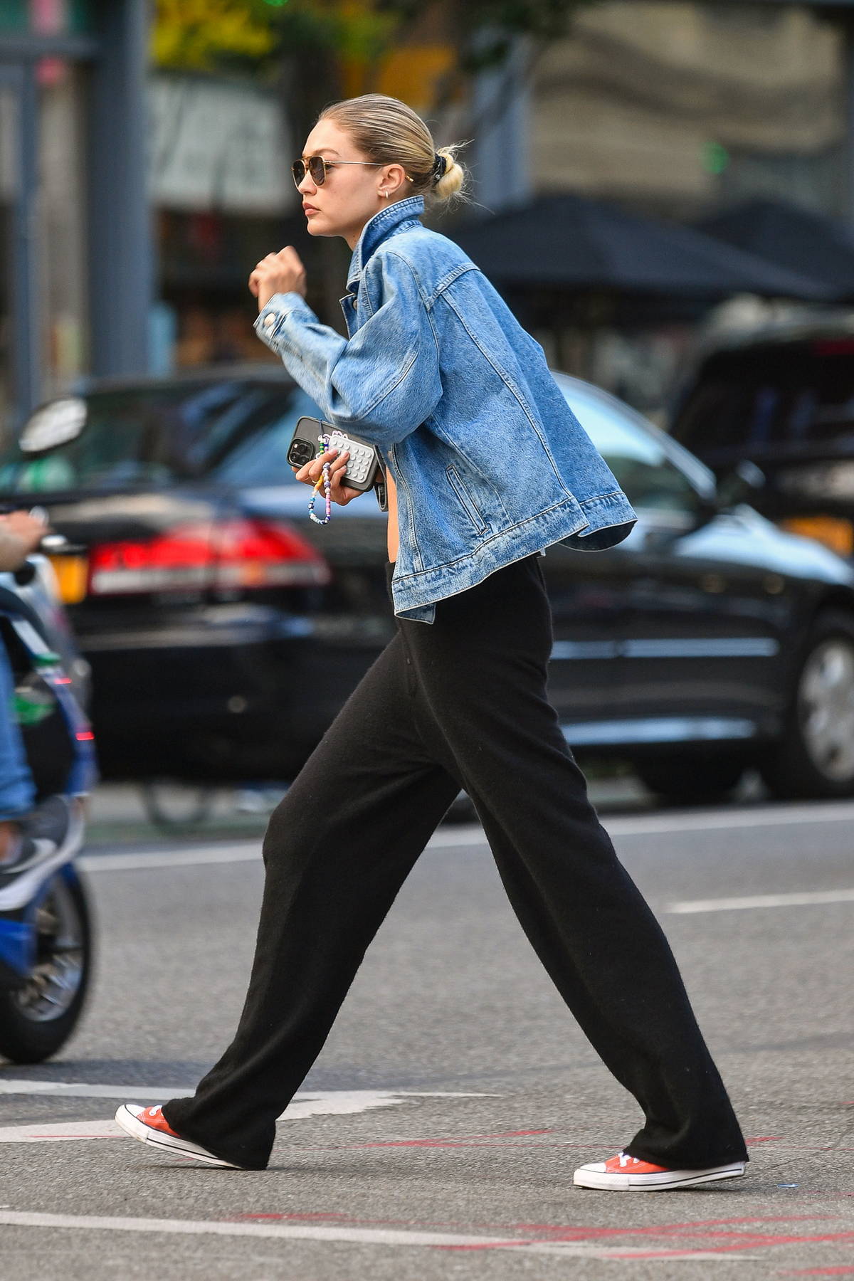 Gigi Hadid keeps things casual in a denim jacket and black joggers