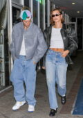 Hailey Bieber and Justin Bieber step out twinning in white tee and jeans while during a dinner outing at Sushi Park in West Hollywood, California