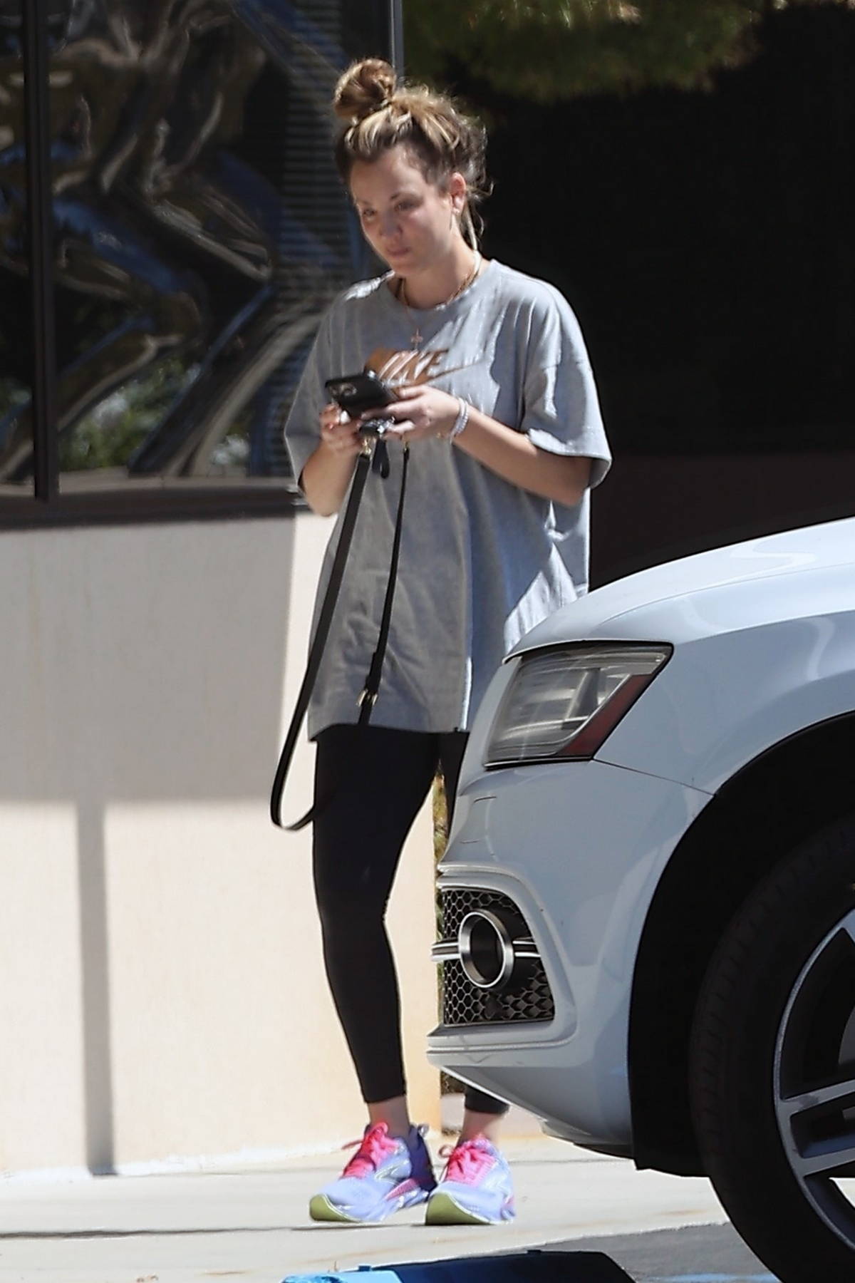 Kaley Cuoco keeps it casual in grey T-shirt and black leggings while out  and about in LA