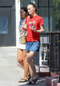 Lily-Rose Depp shows off her slender legs in a denim mini skirt while out for lunch and coffee with a friend in Los Angeles