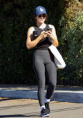 Lucy Hale looks fit in a tank top and leggings while heading out for a workout in Los Angeles
