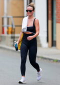 Olivia Wilde shows off her fit physique in a black sports bra and leggings while leaving the gym in Studio City, California