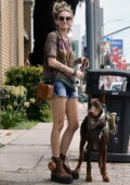 Paris Jackson gets leggy in denim shorts while out on a stroll with her dog in West Hollywood, California