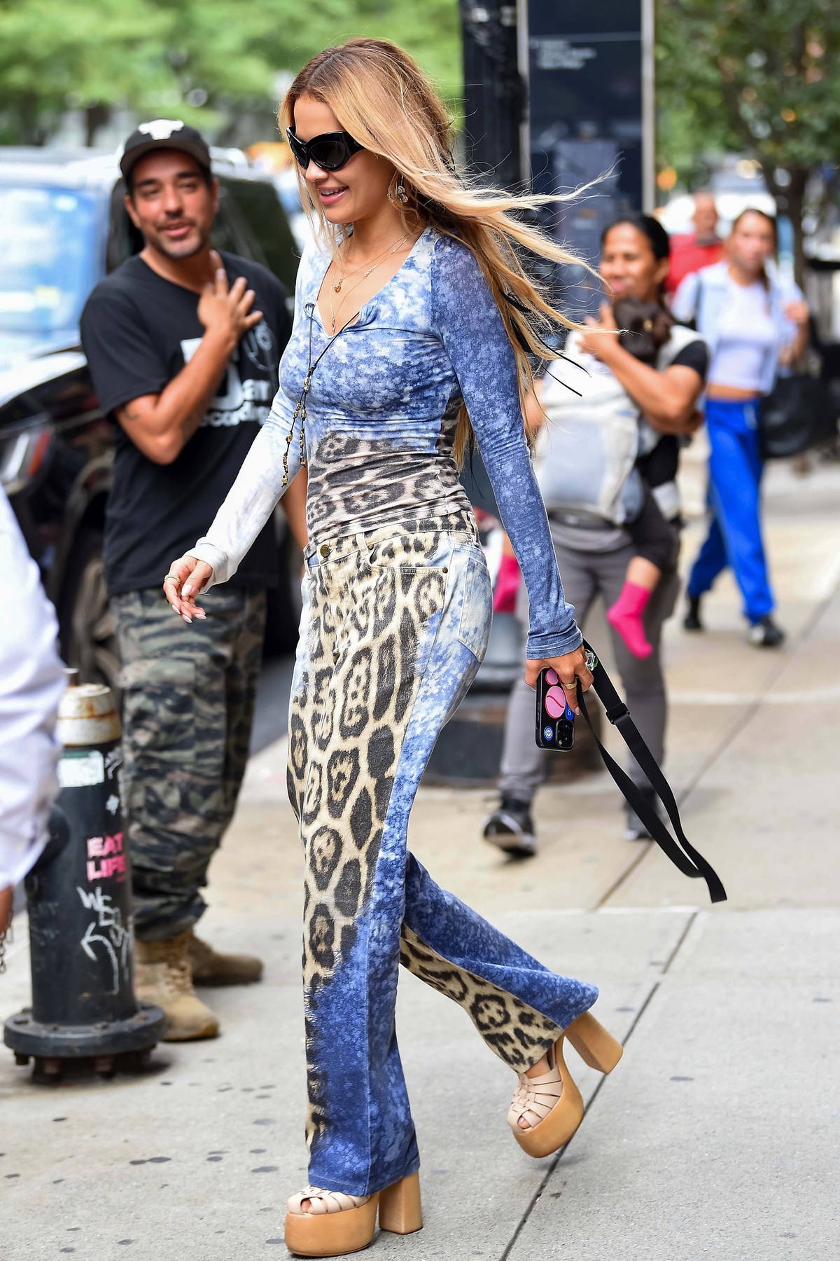Rita Ora looks stylish in an animal print outfit while heading out