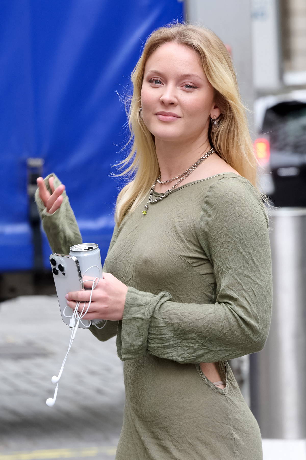 Zara Larsson looks amazing in an olive green dress while seen